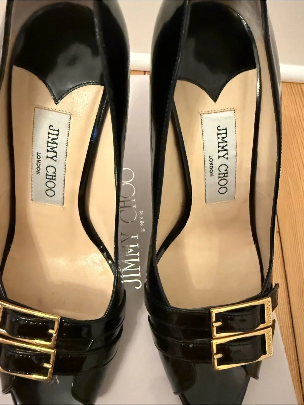 Jimmy Choo Black Patent Leather Peep-Toe Pumps with Gold Buckles